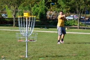 Playing Disc Golf 