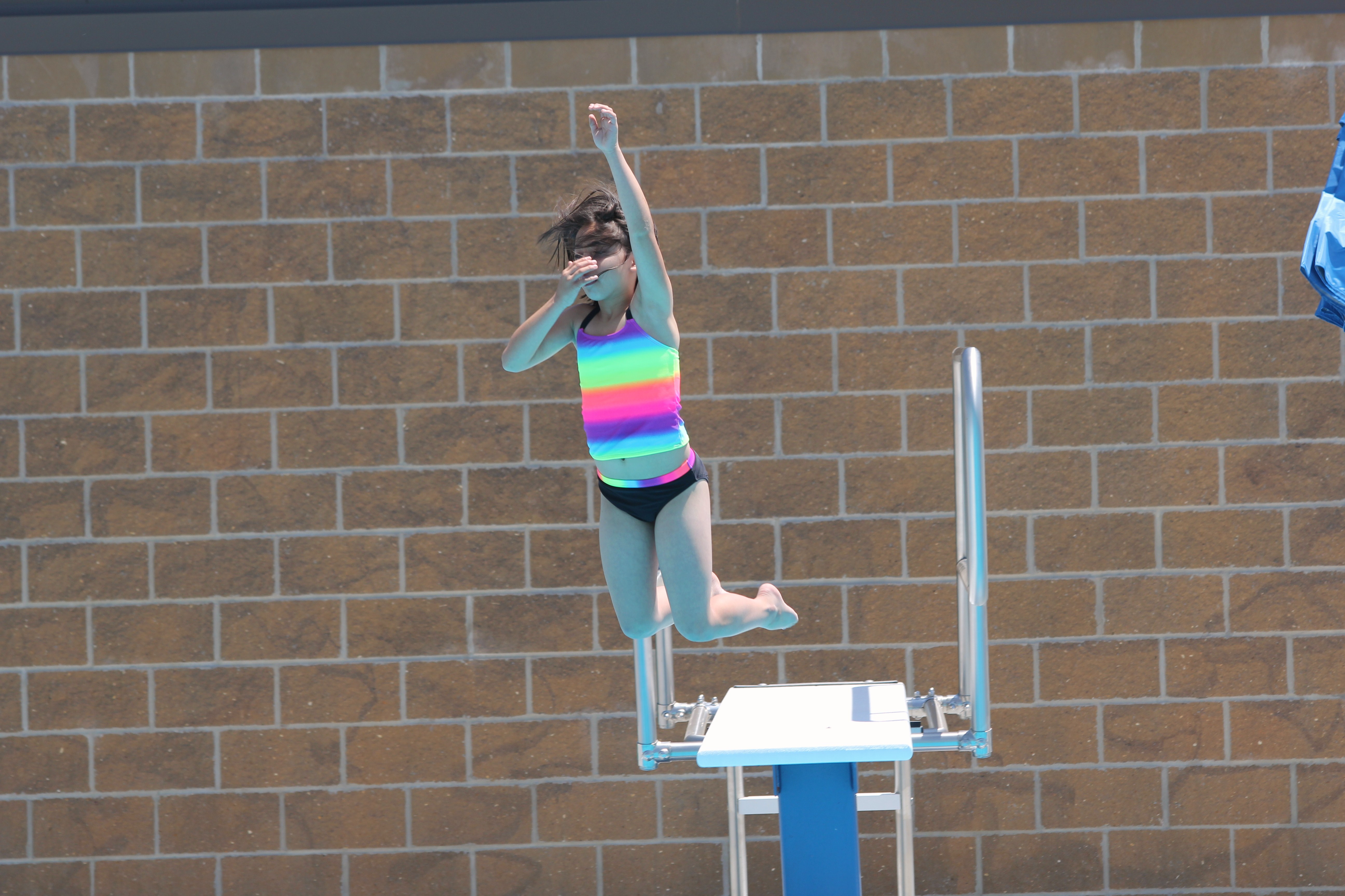 First off the diving board on grand opening day.